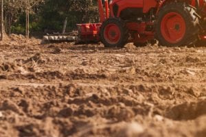 a tractor delivering excavation services in Boone NC