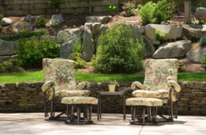 a custom designed landscape with a retaining wall, installed by Premier Landscape